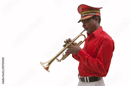 Bandmaster playing on a trumpet