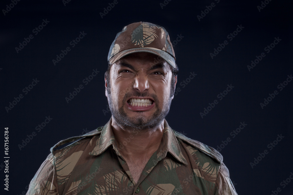 Close-up of an angry Indian soldier 
