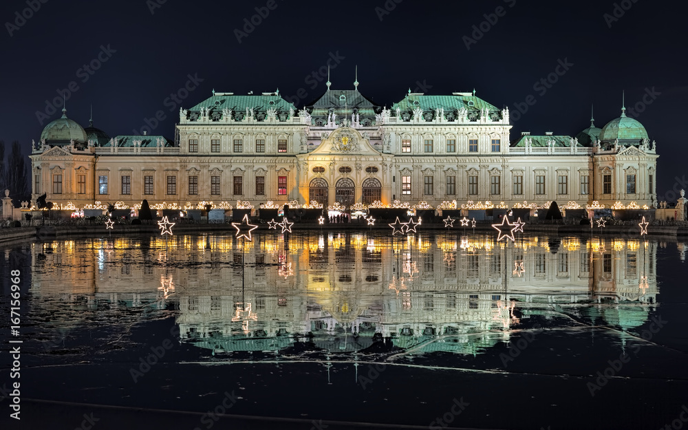 Upper Belvedere Palace with Christmas Village in Vienna in night, Austria