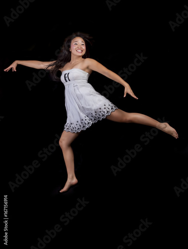 Japanese American Woman Jumping In Dress Big Smile