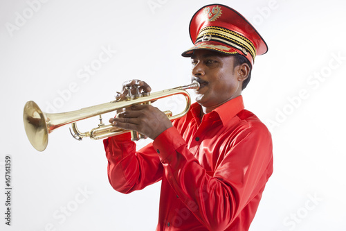 Bandmaster playing on a trumpet