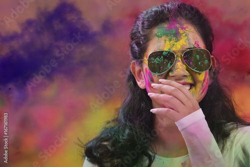 Photography Portrait of an Indian girl at Holi Color festival