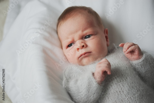 cute funny boy on bright background