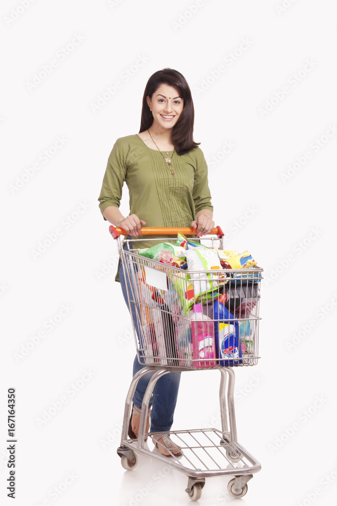 Portrait of a married woman with a shopping cart Portrait of a married woman with a shopping cart