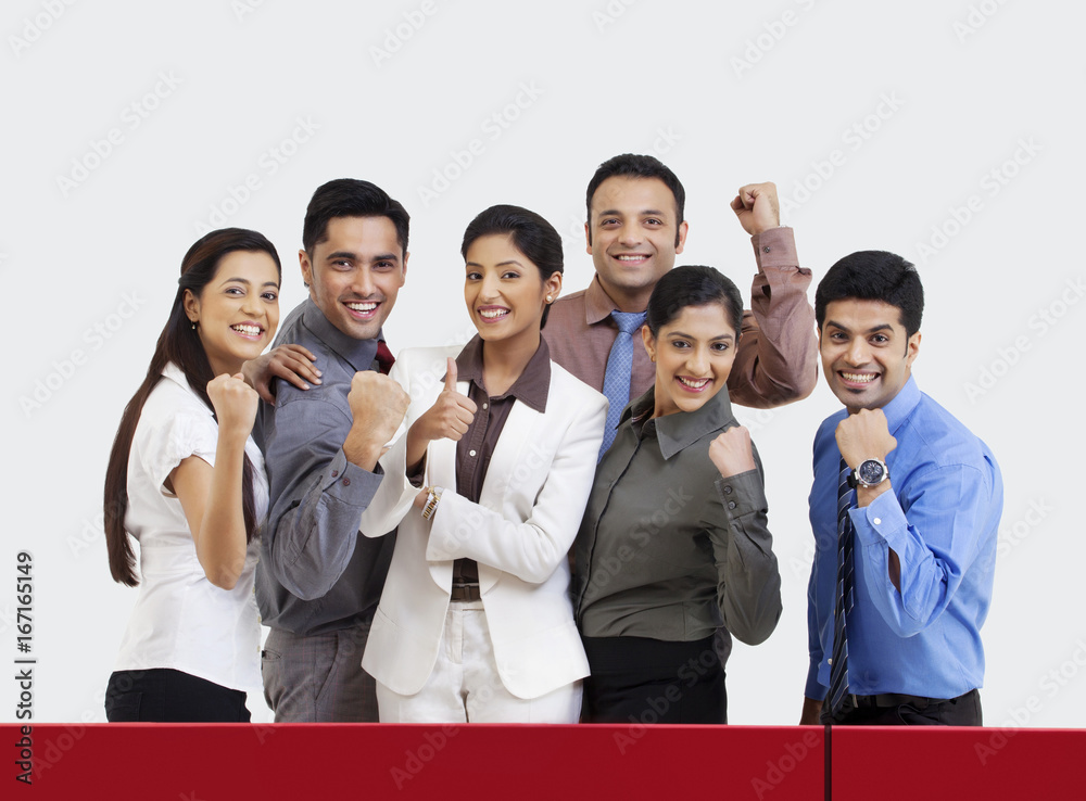 Business executives rejoicing during cricket match Business executives rejoicing during cricket match