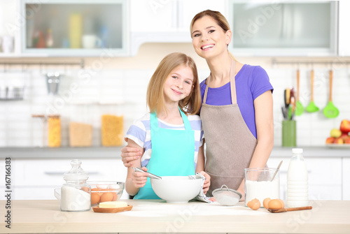 Happy mother and daughter c...