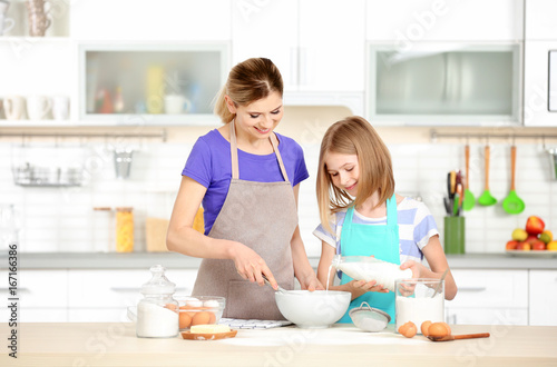 Happy mother and daughter c...