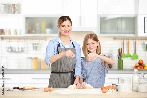 Happy mother and daughter p...