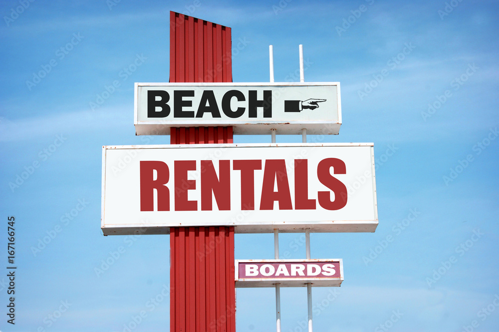 Obraz premium aged beach rentals sign
