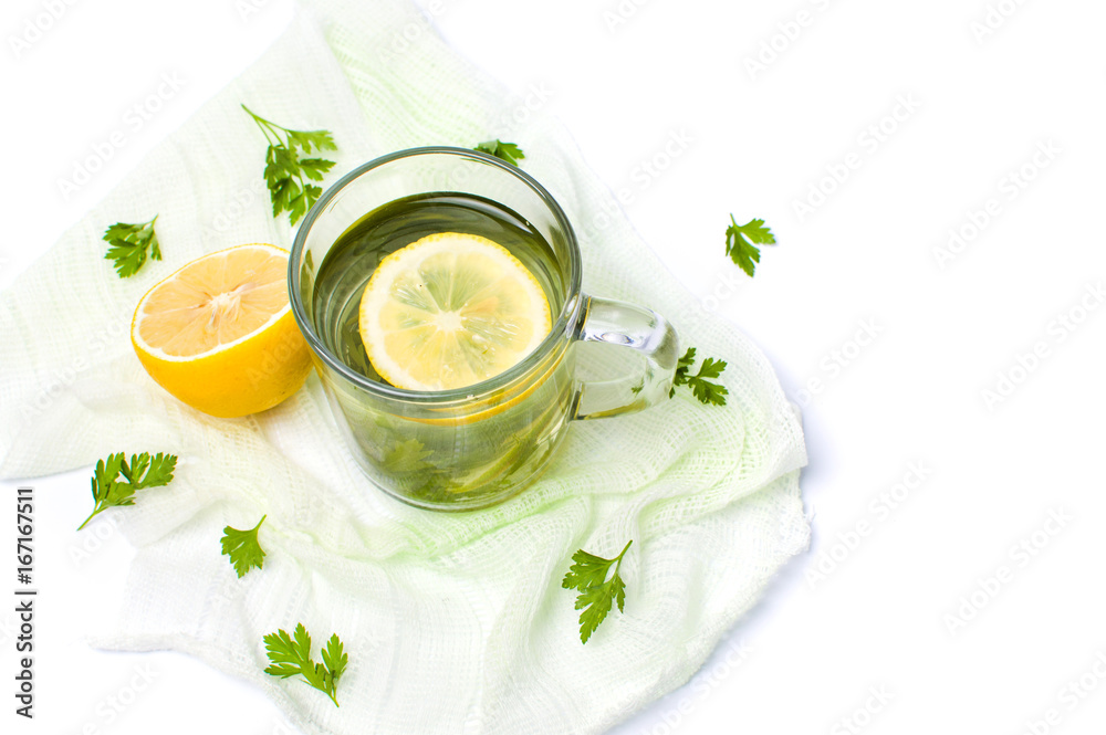 Parsley tea with lemon and lime slices Parsley tea with lemon and lime slices