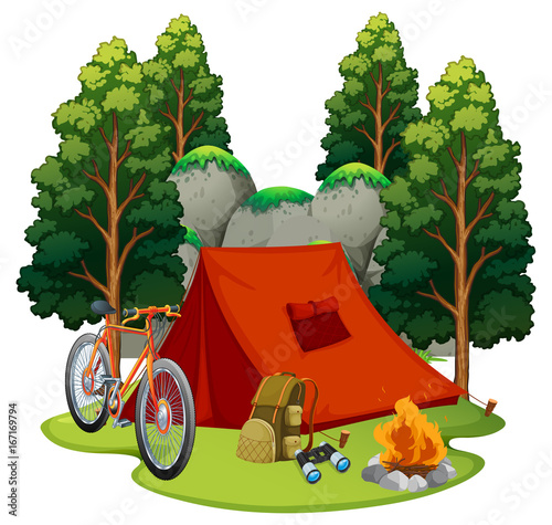 Camping site with tent and campfire