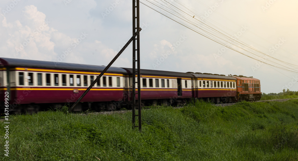 Obraz premium Trains blur on the grass.