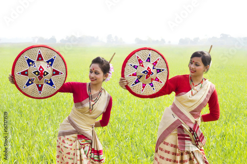 Bihu women holding jaapis  photo