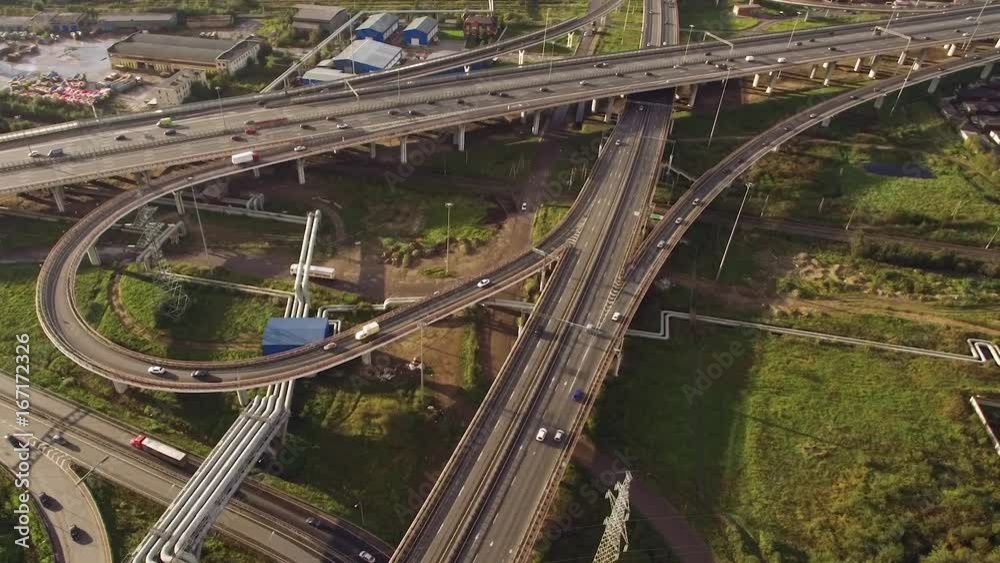 Aerial view of car traffic on road junction Aerial view of car traffic on road junction