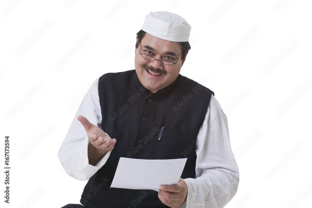 Portrait of smiling politician holding document Portrait of smiling politician holding document