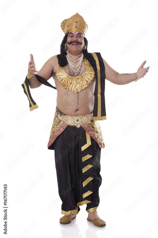 Portrait of a man dressed as Raavan gesturing 