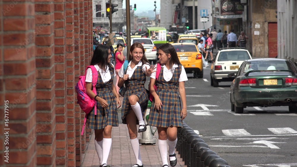 Fun Female Teen Students Walking