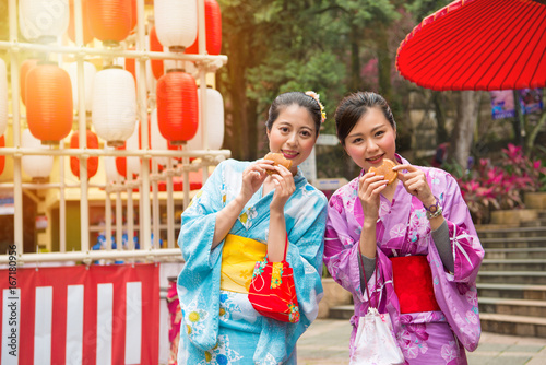young female students wearing the kimono costume