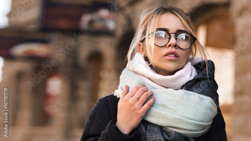 woman in glasses walk autumn morning in sunshine light