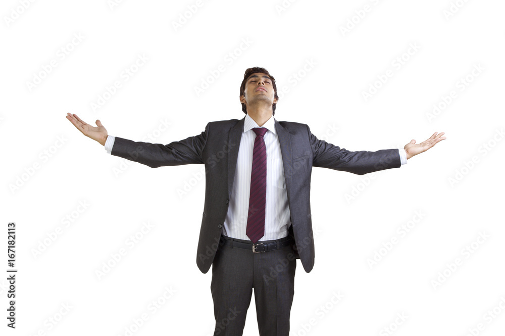 Business executive enjoying with arms outstretched Business executive enjoying with arms outstretched