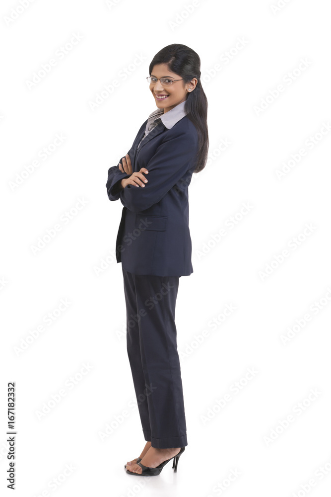 Full length portrait of confident businesswoman with arms crossed isolated over white background Full length portrait of confident businesswoman with arms crossed isolated over white background