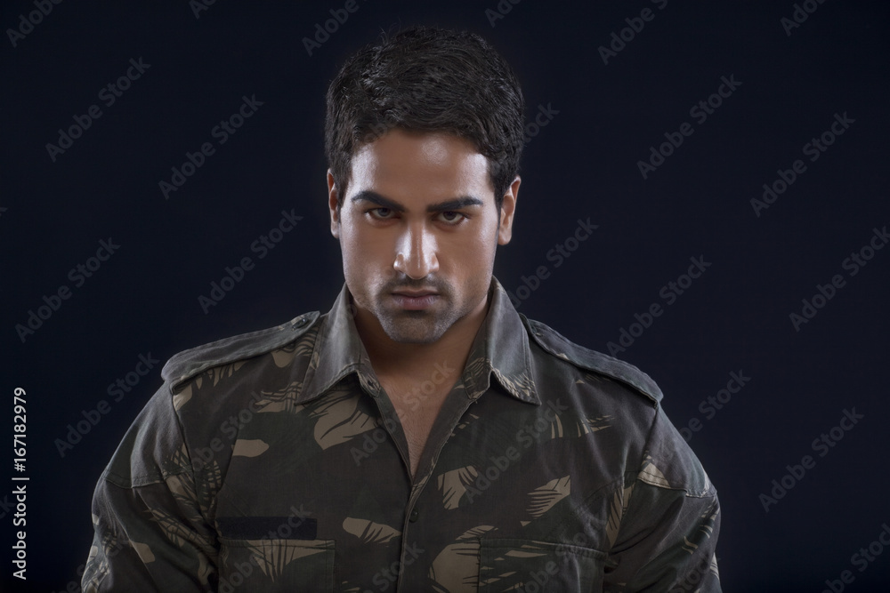 Close-up portrait of an angry young soldier Close-up portrait of an angry young soldier