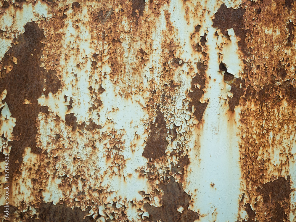 Texture of old rusty metal with streaks of rust and cracked, flaking paint. Surface of rusty metal close-up with old and faded paint. Texture of old rusty metal with streaks of rust and cracked, flaking paint. Surface of rusty metal close-up with old and faded paint.