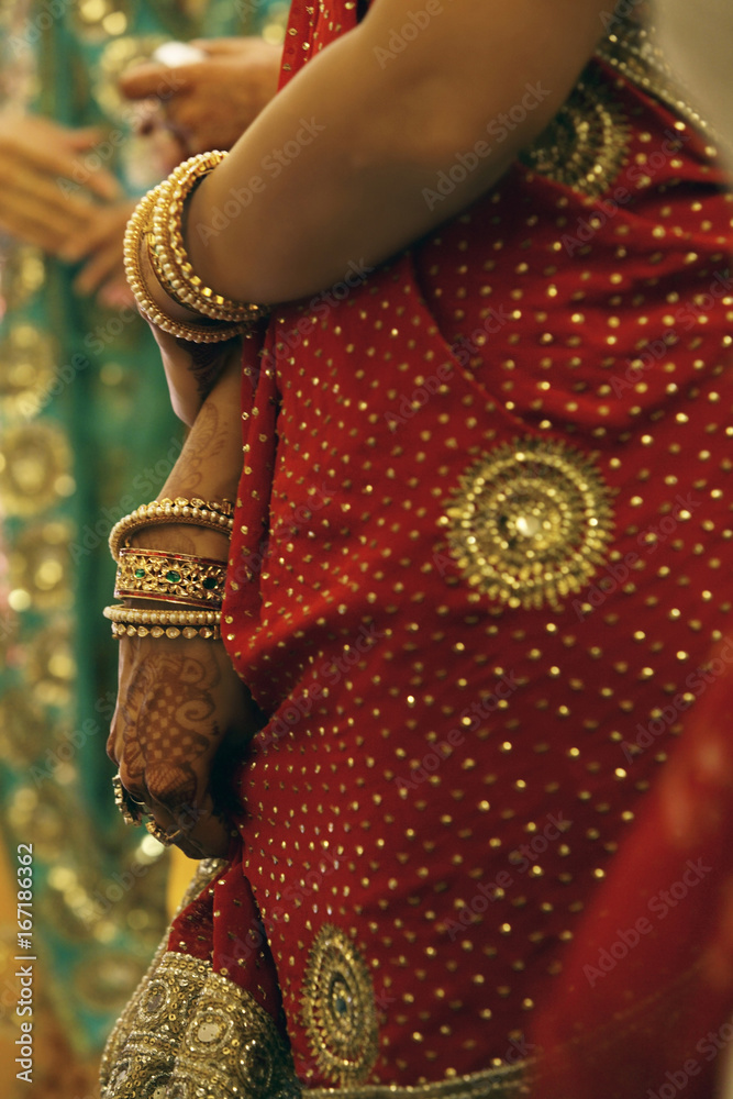 A woman wearing a saree 