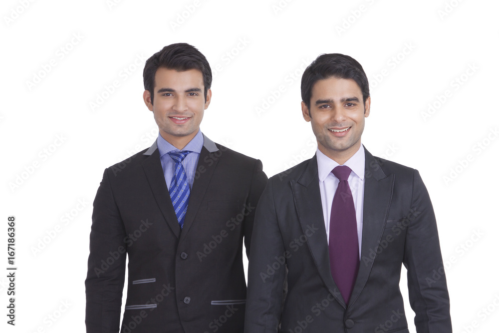 Portrait of two businessmen smiling Portrait of two businessmen smiling