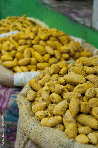 Sacks of turmeric root for sale at the market