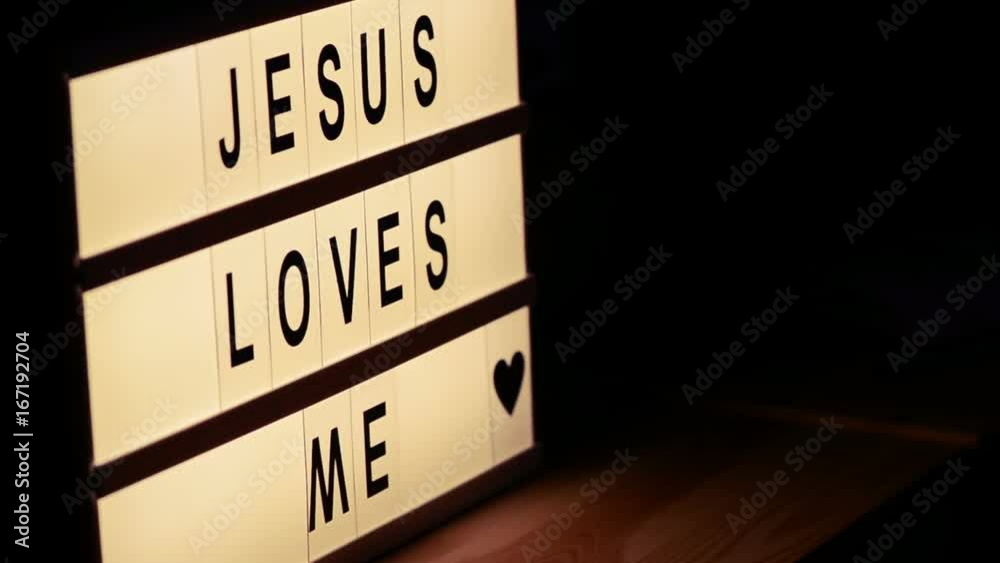 Jesus loves me, religious message lightbox, concept of christianity and faith in God