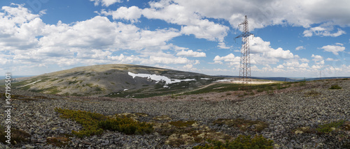 Panorama of mountains with high-voltage power lines