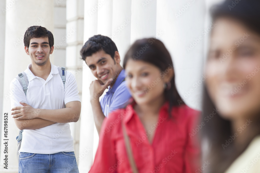 Focus on man with his friends in the foreground Focus on man with his friends in the foreground