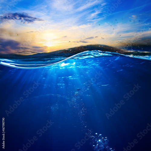 design template with underwater part and sunset skylight splitted by waterline photo