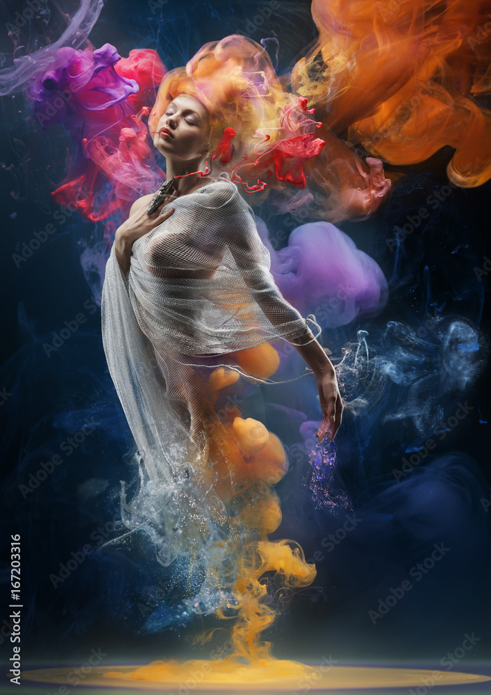 Fashion creative portrait of a blonde girl standing in clouds of watercolor paint - obrazy, fototapety, plakaty 