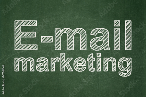 Marketing concept: E-mail Marketing on chalkboard background