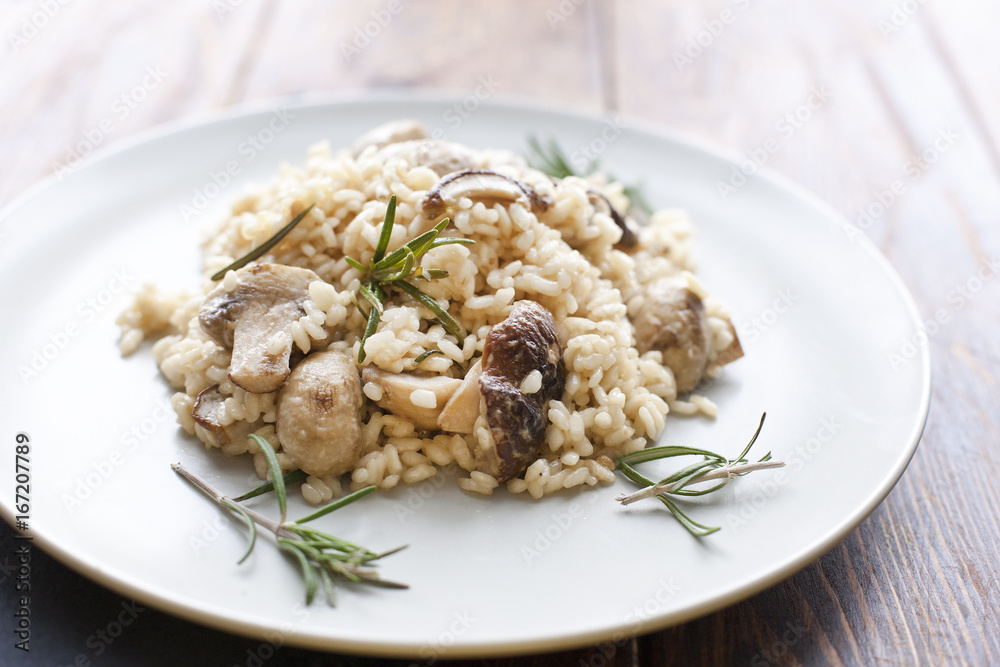 Risotto with mushrooms, herbs and parmesan cheese. Risotto with mushrooms, herbs and parmesan cheese.