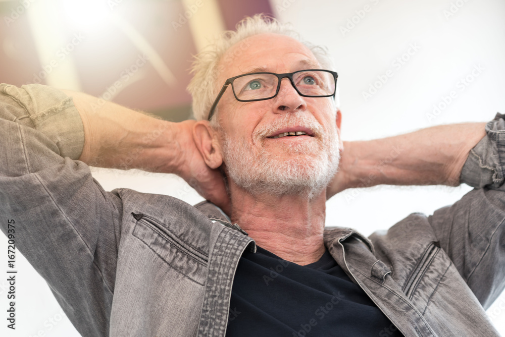 Obraz premium Relaxed man daydreaming, light effect