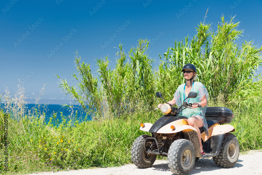 Woman driving quadbike