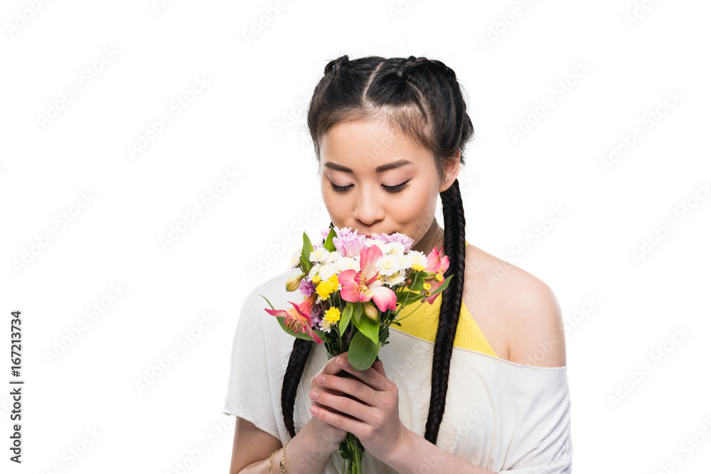 beautiful asian girl with closed eyes smelling flowers isolated on white beautiful asian girl with closed eyes smelling flowers isolated on white