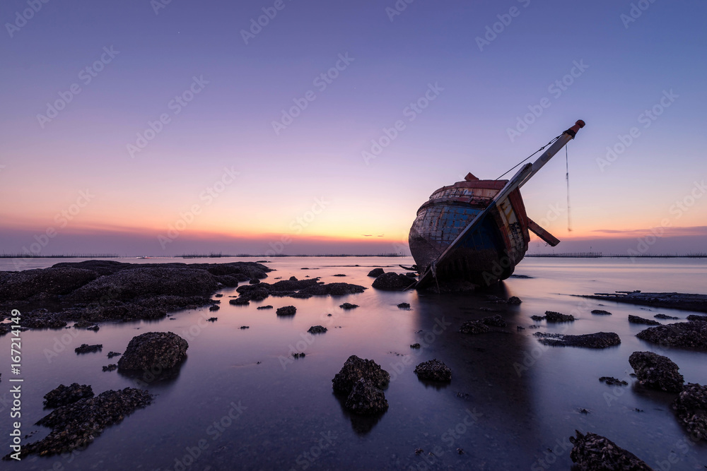 beautiful sunset  ,boat crashes in the sea , landscape  Thailand