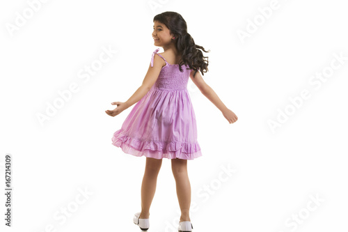 Obraz na plátně Girl twirling around