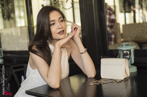 Beautiful woman in restaurant