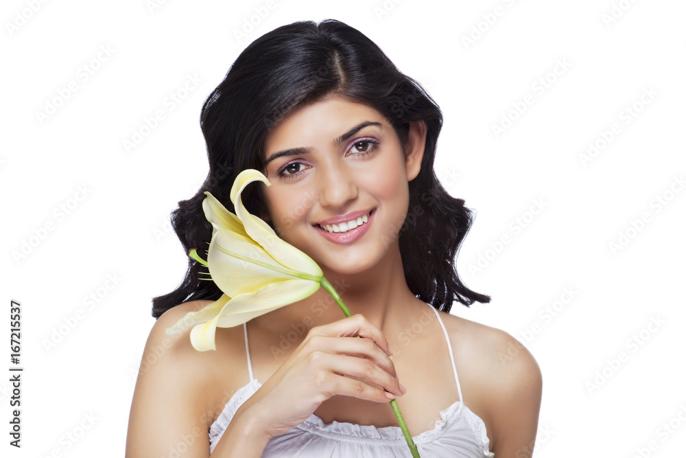 Portrait of young smiling woman over white background Portrait of young smiling woman over white background