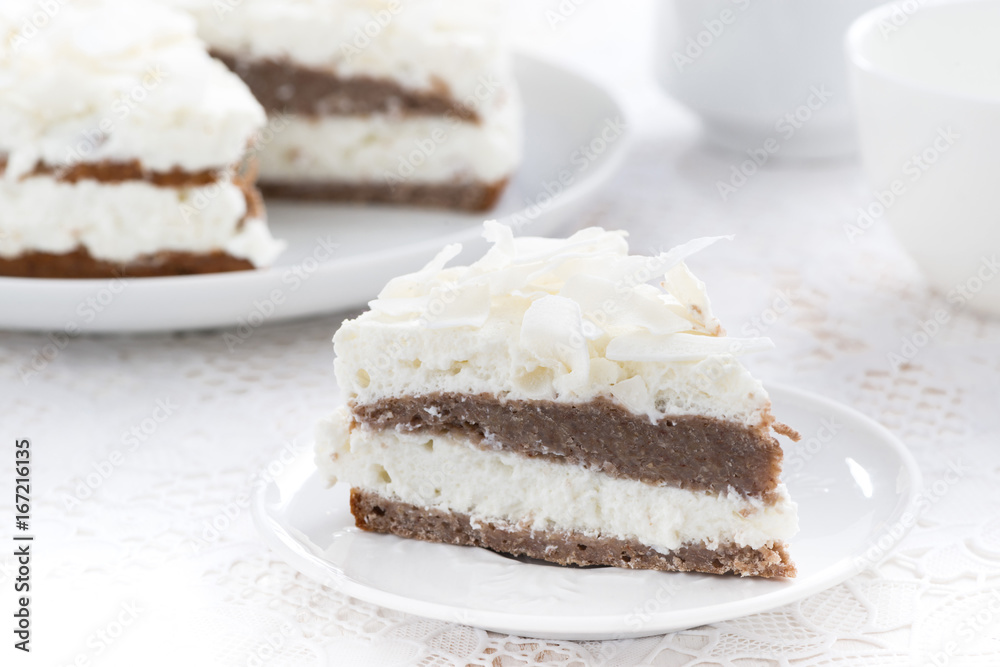 piece of delicious chocolate cake with coconut cream piece of delicious chocolate cake with coconut cream