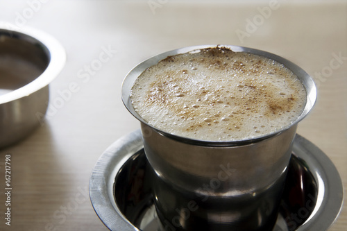 Filter coffee served in a tumbler  photo