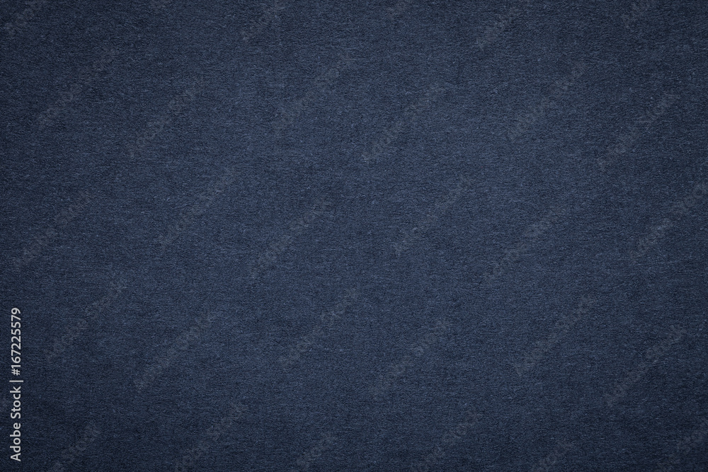 Texture of old navy blue paper background, closeup. Structure of dense dark denim cardboard Texture of old navy blue paper background, closeup. Structure of dense dark denim cardboard