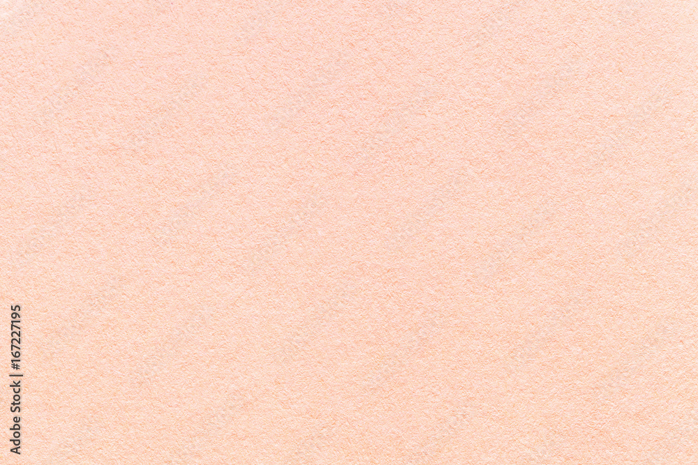 Texture of old light pink paper background, closeup. Structure of dense coral cardboard Texture of old light pink paper background, closeup. Structure of dense coral cardboard