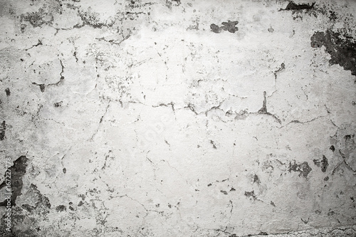 Painted cracked wall texture. Of old paint flaking off the wall. Black and white