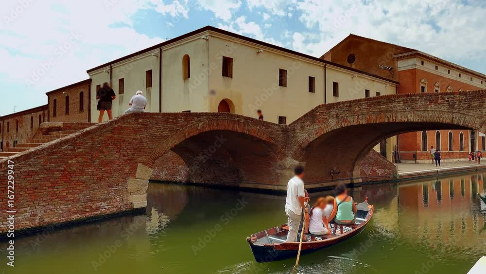 romantic holiday for tourists on Venetian gondola in canal passing under bridges of lagoon city, color graded clip romantic holiday for tourists on Venetian gondola in canal passing under bridges of lagoon city, color graded clip